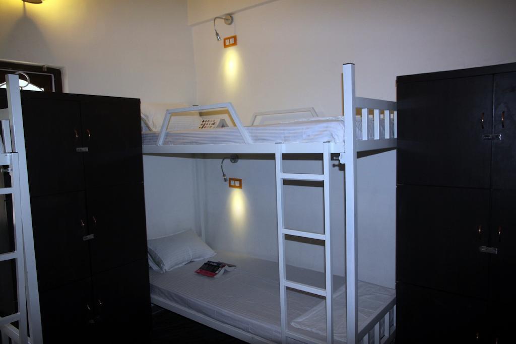 Wanderers Hostel Morjim Zimmer foto