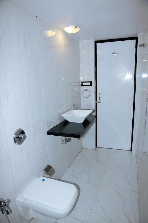 Wanderers Hostel Morjim Zimmer foto